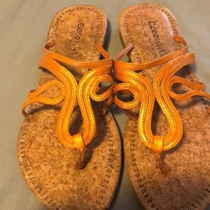 Size 8 orange flip flops by Matisse.